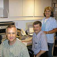 Fred Bartenstein and Frankfurt, Germany listeners Georg and Martha Weber at "Banks of the Ohio World Headquarters," Yellow Springs, OH. August, 2006 (Photo: Virgil Hervey)