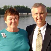 BluegrassCountry.org announcer Katy Daley and Fred Bartenstein, literally on the banks of the Ohio. Taken outside River Park Center, downtown Owensboro,
Kentucky, during the International Bluegrass Music Museum's ROMP Celebration, June, 2009